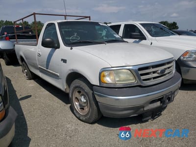 Czwarte zdjęcie samochodu z boku: 2003 FORD F150 VIN:1FTRF17223NA53972 - miniatura