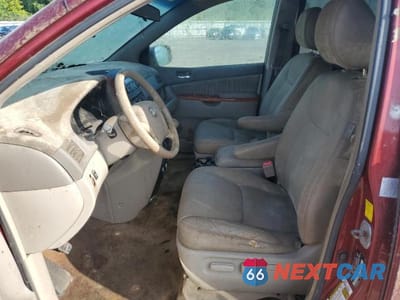 Zdjęcie 7 z 13 samochodu: 2010 TOYOTA SIENNA XLE VIN:5TDDK4CC1AS030664 - miniatura