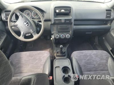 Zdjęcie 8 z 15 samochodu: 2004 HONDA CR-V LX VIN:JHLRD77564C026485 - miniatura