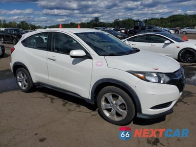 Czwarte zdjęcie samochodu z boku: 2016 HONDA HR-V LX VIN:3CZRU6H38GM749210 - miniatura