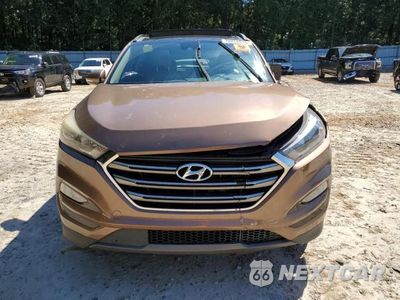 Piąte zdjęcie samochodu w środku: 2016 HYUNDAI TUCSON LIMITED VIN:KM8J33A26GU117996 - miniatura