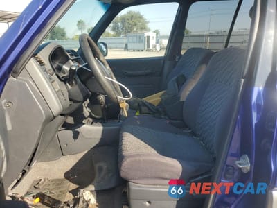 Zdjęcie 7 z 14 samochodu: 2000 TOYOTA RAV4 VIN:JT3GP10V5Y0045561 - miniatura