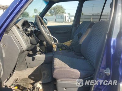 Zdjęcie 7 z 14 samochodu: 2000 TOYOTA RAV4 VIN:JT3GP10V5Y0045561 - miniatura