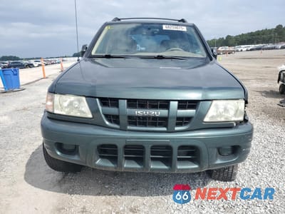 Piąte zdjęcie samochodu w środku: 2004 ISUZU RODEO S VIN:4S2CK58Y044305208 - miniatura