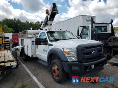 Czwarte zdjęcie samochodu z boku: 2014 FORD F450 SUPER DUTY VIN:1FDUF4GY6EEA62558 - miniatura