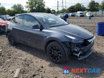 Czwarte zdjęcie samochodu z boku: 2023 TESLA MODEL Y VIN:7SAYGDEE1PA192096 - miniatura