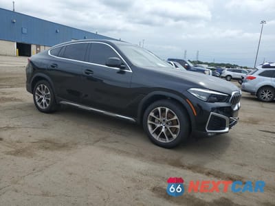 Czwarte zdjęcie samochodu z boku: 2021 BMW X6 XDRIVE40I VIN:5UXCY6C07M9G97609 - miniatura