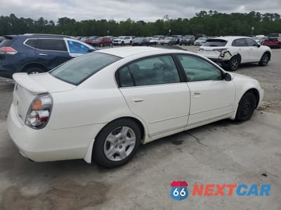 Trzecie zdjęcie samochodu z tyłu: 2003 NISSAN ALTIMA BASE VIN:1N4AL11D63C242836 - miniatura