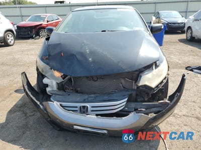 Piąte zdjęcie samochodu w środku: 2010 HONDA INSIGHT EX VIN:JHMZE2H77AS023561 - miniatura