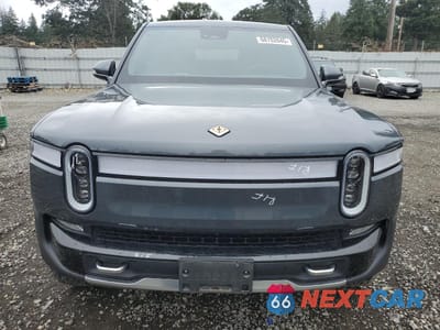 Piąte zdjęcie samochodu w środku: 2023 RIVIAN R1T ADVENTURE VIN:7FCTGAAA7PN023885 - miniatura