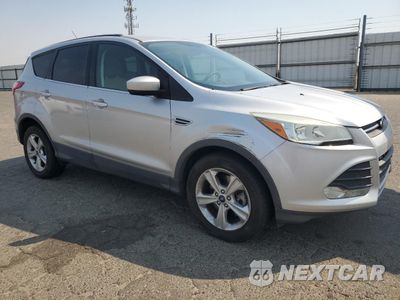 Czwarte zdjęcie samochodu z boku: 2014 FORD ESCAPE SE VIN:1FMCU0G92EUD88589 - miniatura