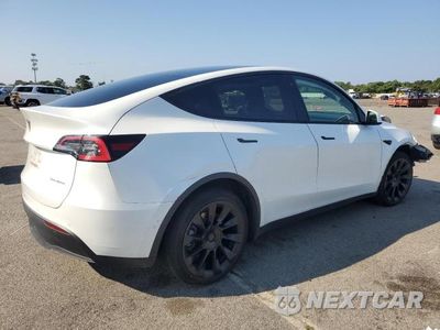 Trzecie zdjęcie samochodu z tyłu: 2021 TESLA MODEL Y VIN:5YJYGDEE8MF090659 - miniatura