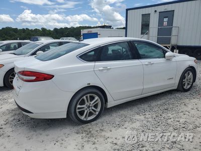 Trzecie zdjęcie samochodu z tyłu: 2018 FORD FUSION SE HYBRID VIN:3FA6P0LU9JR281923 - miniatura