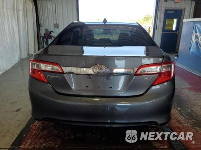 Zdjęcie 6 z 12 samochodu: 2014 TOYOTA CAMRY L VIN:4T1BF1FKXEU422164 - miniatura