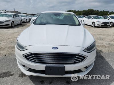 Piąte zdjęcie samochodu w środku: 2017 FORD FUSION SE HYBRID VIN:3FA6P0LU0HR410111 - miniatura