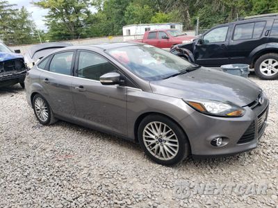 Czwarte zdjęcie samochodu z boku: 2014 FORD FOCUS TITANIUM VIN:1FADP3J27EL205504 - miniatura