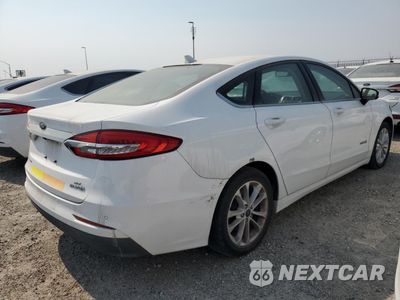 Trzecie zdjęcie samochodu z tyłu: 2017 FORD FUSION SE HYBRID VIN:3FA6P0LU6HR409190 - miniatura