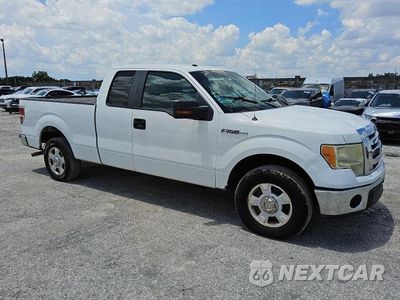 Czwarte zdjęcie samochodu z boku: 2010 FORD F150 SUPER CAB VIN:1FTEX1C84AFD50965 - miniatura