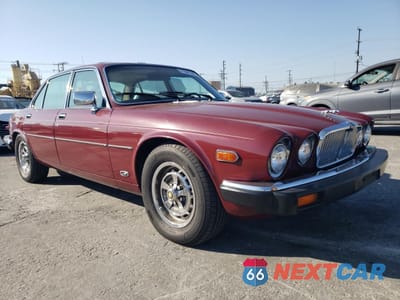 Czwarte zdjęcie samochodu z boku: 1986 JAGUAR XJ6 VIN:SAJJAVLN4GC453303 - miniatura