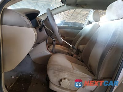 Zdjęcie 7 z 12 samochodu: 2003 TOYOTA COROLLA CE VIN:1NXBR32E43Z013013 - miniatura