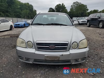 Piąte zdjęcie samochodu w środku: 2006 KIA OPTIMA LX VIN:KNAGD128065443852 - miniatura