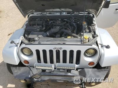Zdjęcie 11 z 12 samochodu: 2009 JEEP WRANGLER UNLIMITED SAHARA VIN:1J8GA59139L785963 - miniatura