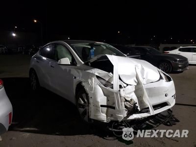 Czwarte zdjęcie samochodu z boku: 2021 TESLA MODEL Y VIN:5YJYGDEE4MF159962 - miniatura