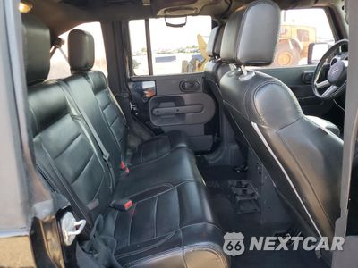 Zdjęcie 11 z 15 samochodu: 2010 JEEP WRANGLER UNLIMITED SAHARA VIN:1J4HA5H17AL126036 - miniatura
