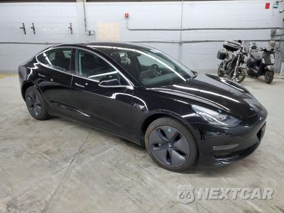 Czwarte zdjęcie samochodu z boku: 2018 TESLA MODEL 3 VIN:5YJ3E1EB5JF144239 - miniatura