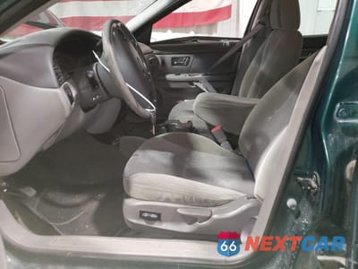 Zdjęcie 7 z 13 samochodu: 2000 FORD TAURUS SE VIN:1FAFP5828YG225641 - miniatura