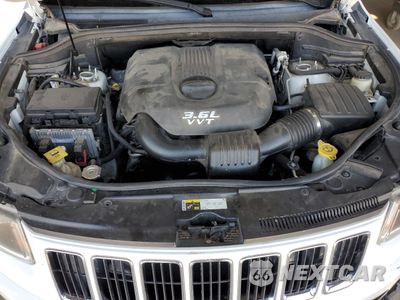 Zdjęcie 12 z 15 samochodu: 2014 JEEP GRAND CHEROKEE LAREDO VIN:1C4RJFAGXEC186476 - miniatura