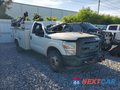 Czwarte zdjęcie samochodu z boku: 2014 FORD F350 SUPER DUTY VIN:1FDRF3G60EEB42842 - miniatura