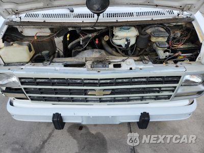Zdjęcie 12 z 13 samochodu: 1993 CHEVROLET G20 VIN:1GCEG25H3PF340021 - miniatura