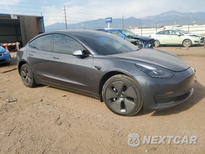 Czwarte zdjęcie samochodu z boku: 2023 TESLA MODEL 3 VIN:5YJ3E1EB8PF634733 - miniatura