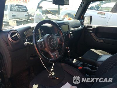 Zdjęcie 8 z 13 samochodu: 2016 JEEP WRANGLER SPORT VIN:1C4GJWAG7GL128044 - miniatura