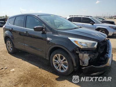 Czwarte zdjęcie samochodu z boku: 2017 FORD ESCAPE SE VIN:1FMCU9GD6HUD67306 - miniatura