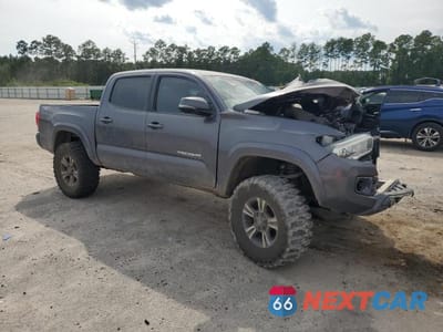Czwarte zdjęcie samochodu z boku: 2018 TOYOTA TACOMA DOUBLE CAB VIN:5TFCZ5AN9JX134878 - miniatura