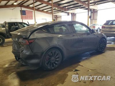 Trzecie zdjęcie samochodu z tyłu: 2022 TESLA MODEL Y VIN:7SAYGDEF9NF401058 - miniatura