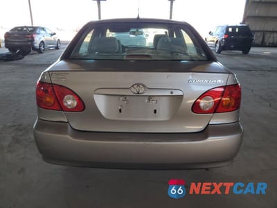 Zdjęcie 6 z 12 samochodu: 2003 TOYOTA COROLLA CE VIN:1NXBR32E43Z013013 - miniatura