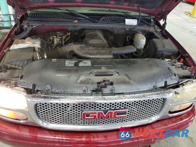 Zdjęcie 12 z 13 samochodu: 2006 GMC YUKON XL DENALI VIN:1GKFK66U36J147969 - miniatura