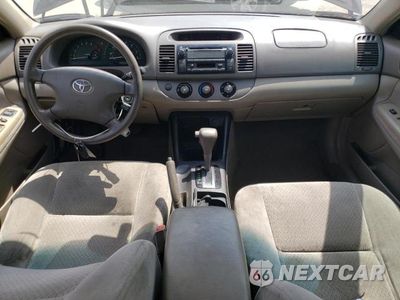Zdjęcie 8 z 13 samochodu: 2004 TOYOTA CAMRY LE VIN:4T1BE32K14U790817 - miniatura