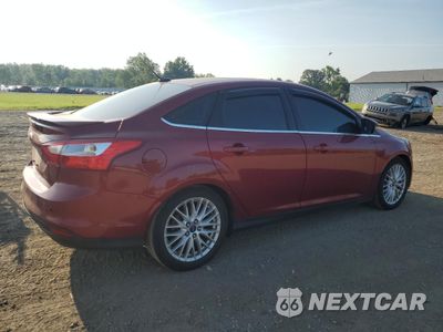 Trzecie zdjęcie samochodu z tyłu: 2014 FORD FOCUS TITANIUM VIN:1FADP3J22EL181712 - miniatura