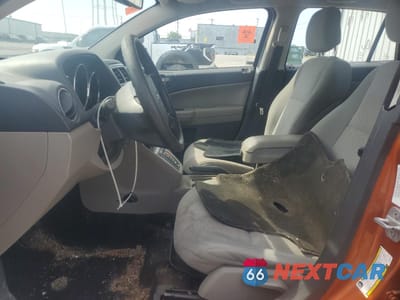 Zdjęcie 7 z 12 samochodu: 2011 DODGE CALIBER MAINSTREET VIN:1B3CB3HA9BD254258 - miniatura