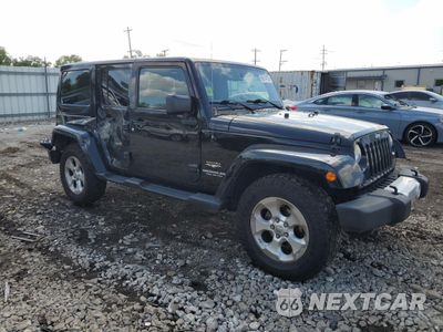 Czwarte zdjęcie samochodu z boku: 2014 JEEP WRANGLER UNLIMITED SAHARA VIN:1C4HJWEG4EL272890 - miniatura