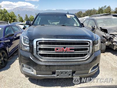 Piąte zdjęcie samochodu w środku: 2017 GMC YUKON SLT VIN:1GKS1BKC1HR401576 - miniatura