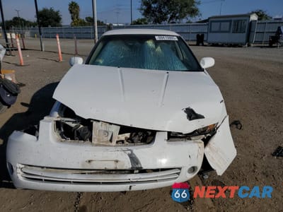 Piąte zdjęcie samochodu w środku: 2003 NISSAN SENTRA XE VIN:3N1CB51D73L794818 - miniatura