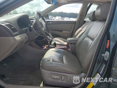 Zdjęcie 7 z 15 samochodu: 2004 TOYOTA CAMRY LE VIN:4T1BF30K74U077548 - miniatura