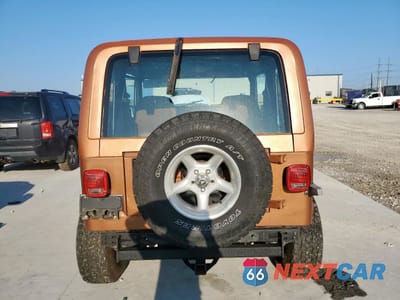 Zdjęcie 6 z 14 samochodu: 1987 JEEP WRANGLER LAREDO VIN:2BCCL8143HB514067 - miniatura