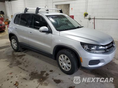 Czwarte zdjęcie samochodu z boku: 2014 VOLKSWAGEN TIGUAN S VIN:WVGCV3AX9EW546193 - miniatura