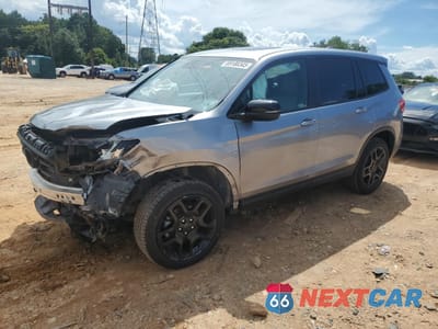 2023 HONDA PASSPORT EXL 5FNYF8H59PB029556 - główne zdjęcie licytacji z USA - miniatura